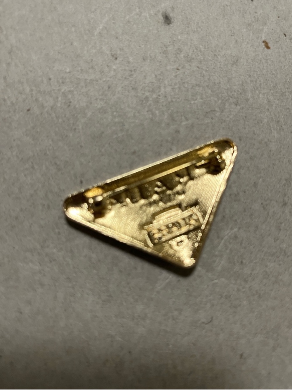 Prada White Enamel Triangle Logo Pin with Gold Accents - Picture 2 of 3